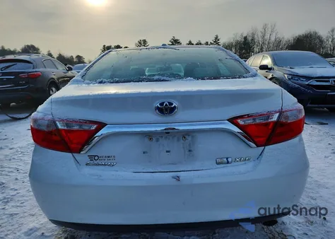 2015 Toyota Camry Hybrid from USA, damaged, VIN 4T1BD1FK4FU143140